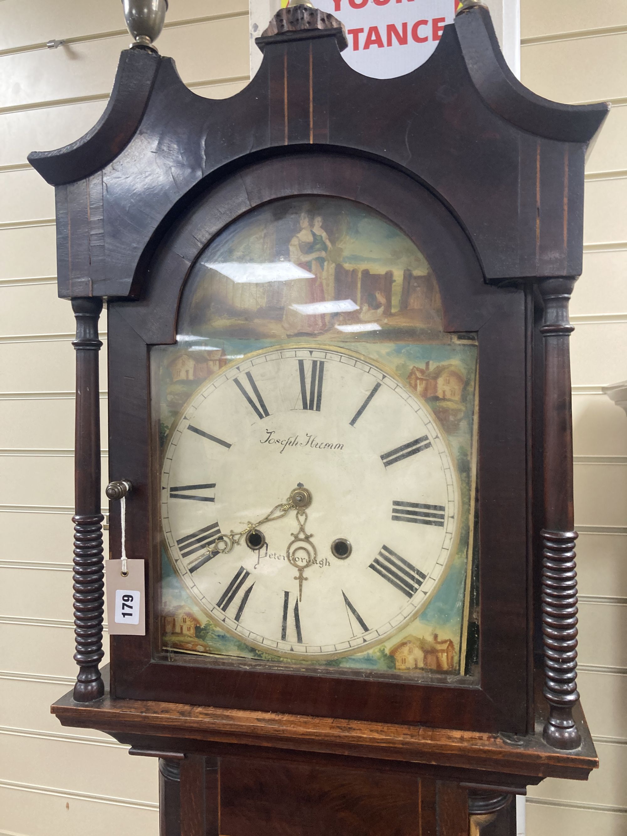 Joseph Humm[ell] of Peterborough. An early 19th century inlaid mahogany and oak eight day longcase clock, height 216cm